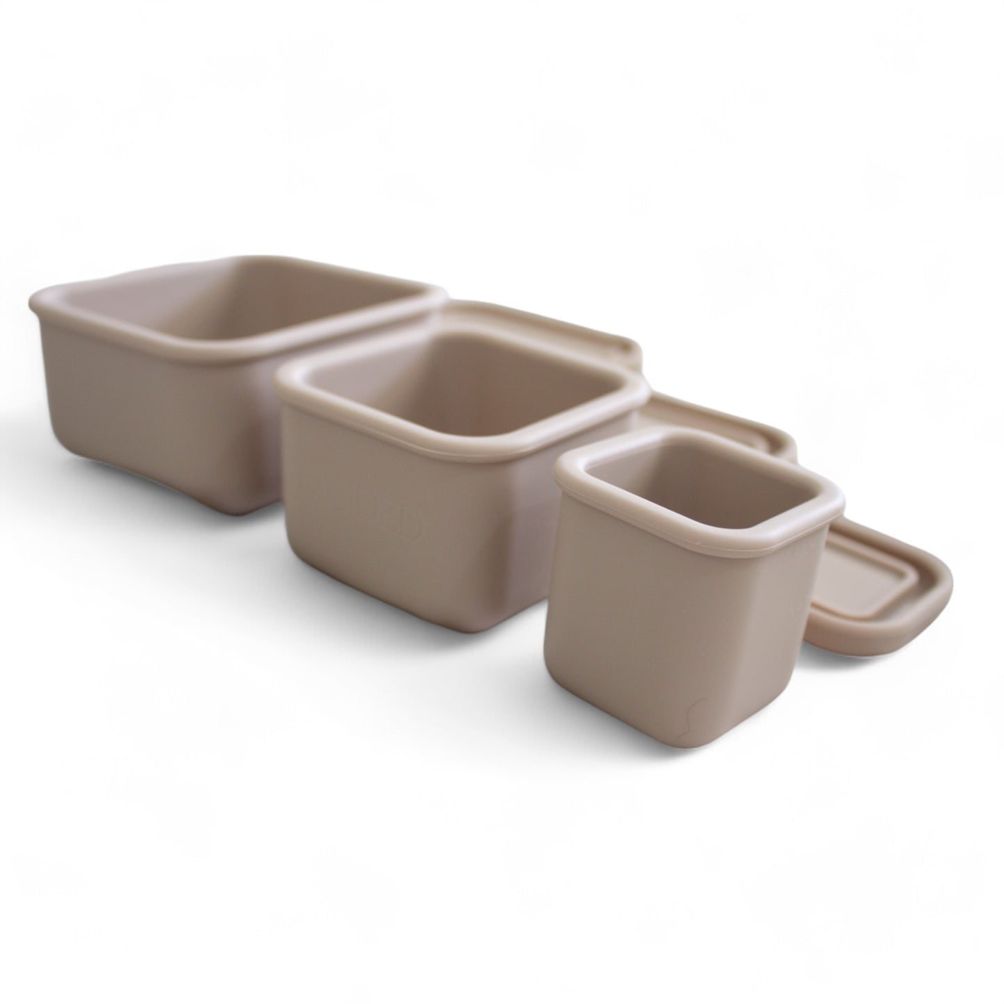 close up of 3 silicone snack boxes with leakprof lid