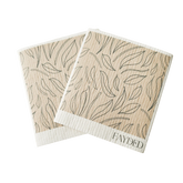 Two beige swedish dishcloths with leaf pattern and 'Fayded' branding on a white background