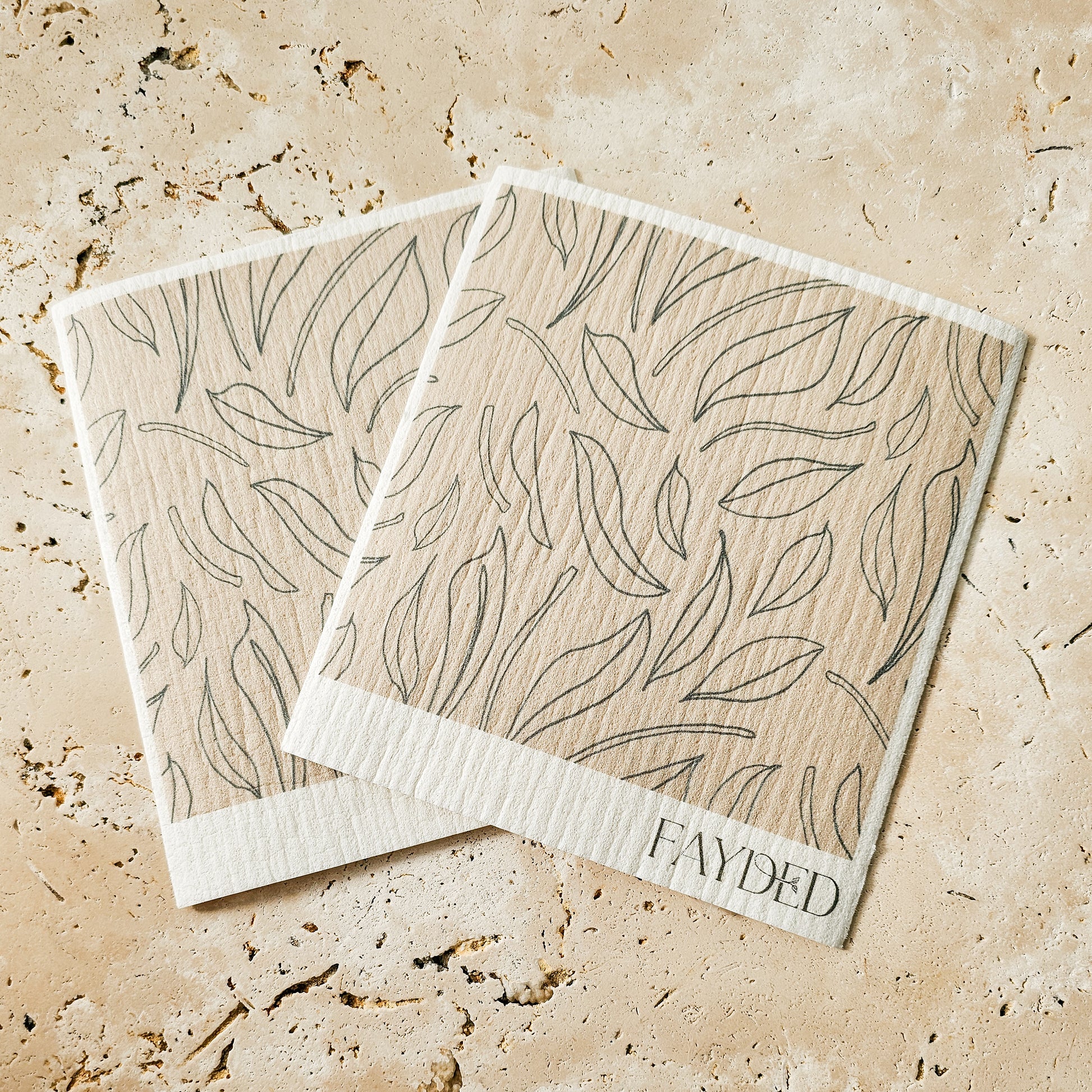 Reusable beige Swedish sponge cloths – plastic-free kitchen cleaning solution by Fayded