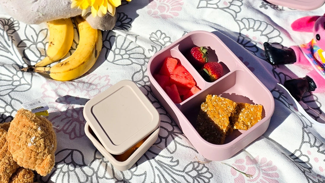 Bento Styled on a picnic rug with fresh strawberries and watermelon