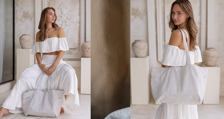Woman holding a light gray tote bag in a neutral setting 