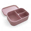 Pink bento box with compartments on a white background