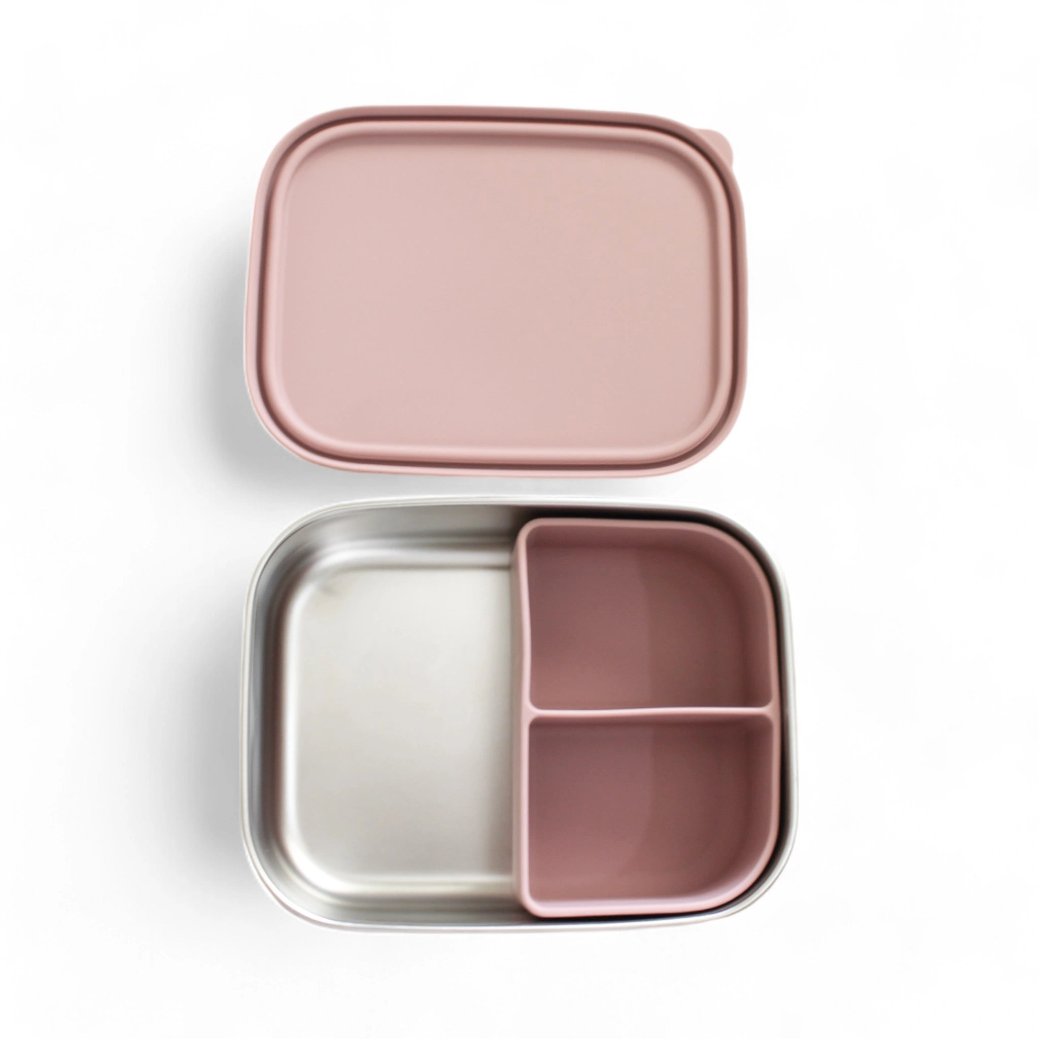 Pink bento box with a lid on a white background