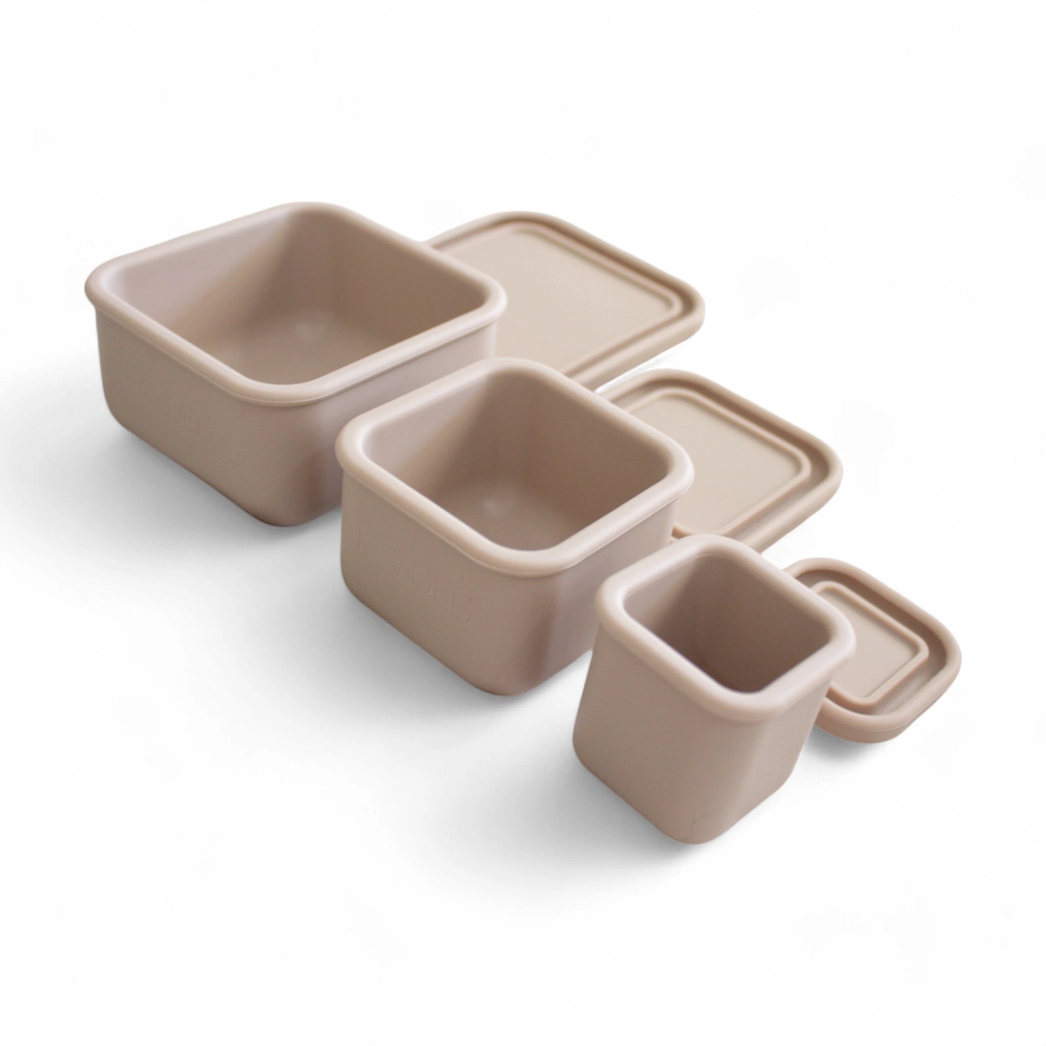 3 tan silicone snack boxes